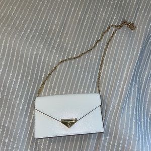 White Micheal Kors purse with gold details